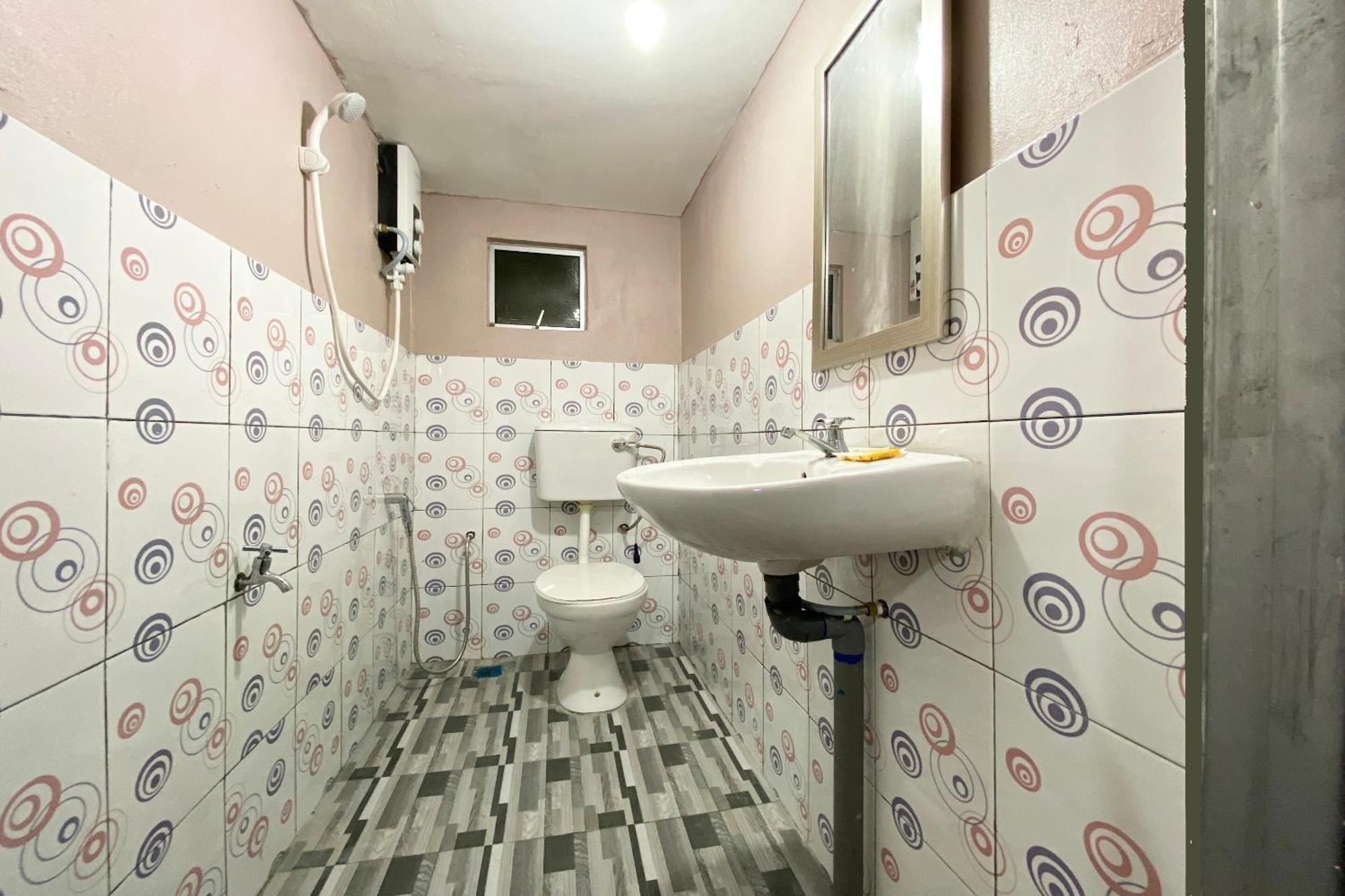 Oyo 90285 Pogimpaan Homestay